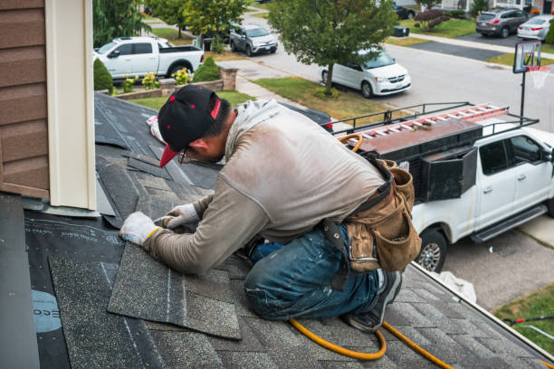 Professional Roofing technician working in Tolland, CT